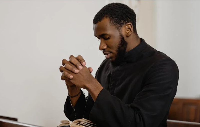 a black man praying to God | The Interesting Story of the Birth of ContentCreationCollege.com
